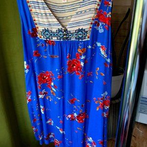 Floral blue shirt.